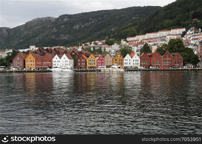 Famous Bryggen street with wooden colored houses in Bergen