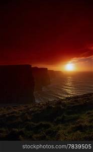 Famous cliffs of Moher at sunset in Co. Clare Ireland Europe. Beautiful landscape as natural attraction.