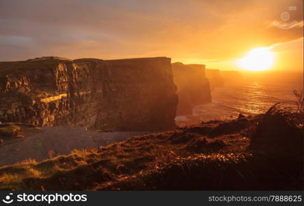 Famous cliffs of Moher at sunset in Co. Clare Ireland Europe. Beautiful landscape natural attraction.