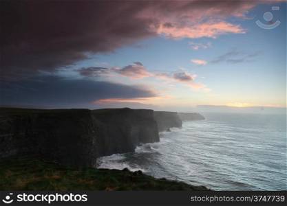 Famous cliffs of Moher at sunset in Co. Clare Ireland natural attraction