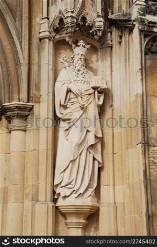 famous entrance of Gloucester Cathedral with sculpture, England (United Kingdom)