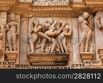 Famous erotic stone carving sculptures, Devi Jagadamba Temple, Khajuraho, India. Unesco World Heritage Site