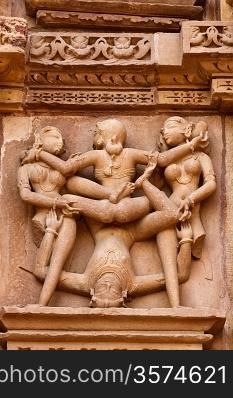 Famous erotic stone carving sculptures, Devi Jagadamba Temple, Khajuraho, India. Unesco World Heritage Site