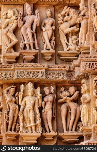 Famous erotic stone carving sculptures, Lakshmana  Temple, Khajuraho, India. Unesco World Heritage Site. Famous sculptures of Khajuraho temples, India