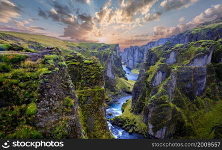 Famous Fjadrargljufur canyon in Iceland with colorful sunset. Top tourism destination. South East of Iceland, Europe