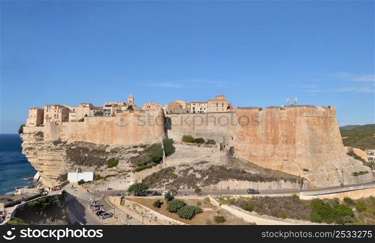 famous fortress at Bonifacio in Corsica under blue sky