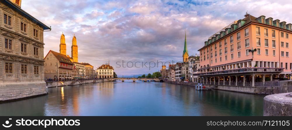 Famous Fraumunster, Grossmunster and Wasserkirche churches along river Limmat at sunrise in Old Town of Zurich, the largest city in Switzerland. Zurich, largest city in Switzerland