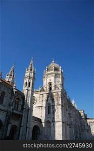 famous Hieronymites Monastery landmark in Lisbon, Portugal (blue sky background)