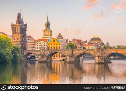 Famous iconic image of Charles bridge and Prague city skyline in Czech Republic