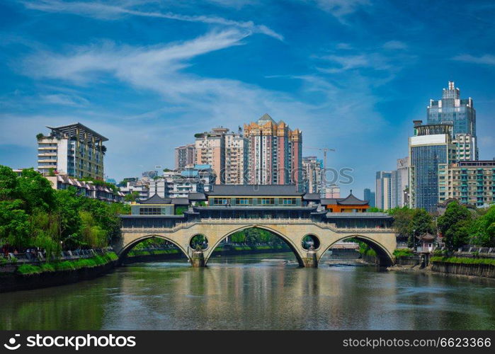 Famous landmark of Chengdue - Anshun bridge over Jin River, Chengdue, Sichuan , China. Anshun bridge at day. Chengdu, China
