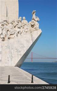 famous monument to the maritime discoveries in Lisbon, Portugal (April 25th bridge on the background)
