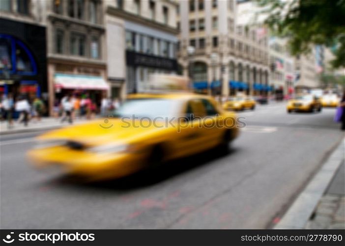 Famous New York yellow taxi cabs - intentional blur