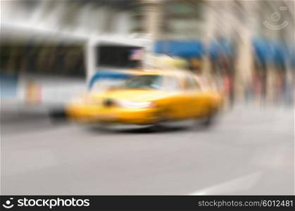 Famous New York yellow taxi cabs - intentional blur