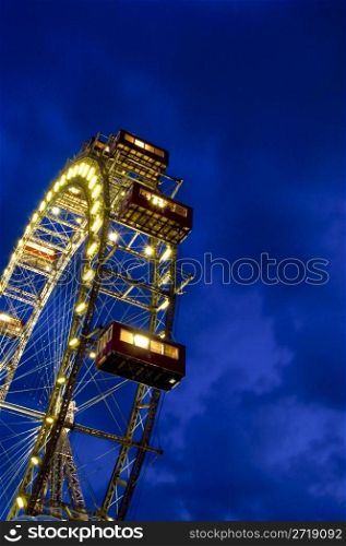famous old ferris wheel at the Prater at night