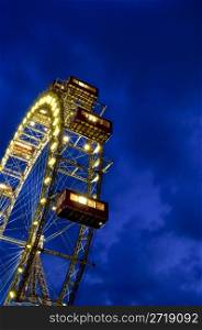 famous old ferris wheel at the Prater at night