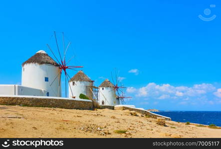  Famous old windmills on the seashore in Mykonos Island, Greece. Space for your own text                                      