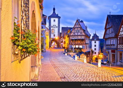 Famous Plonlein gate and cobbled street of historic town of Rothenburg ob der Tauber evening view, Romantic road of Bavaria region of Germany