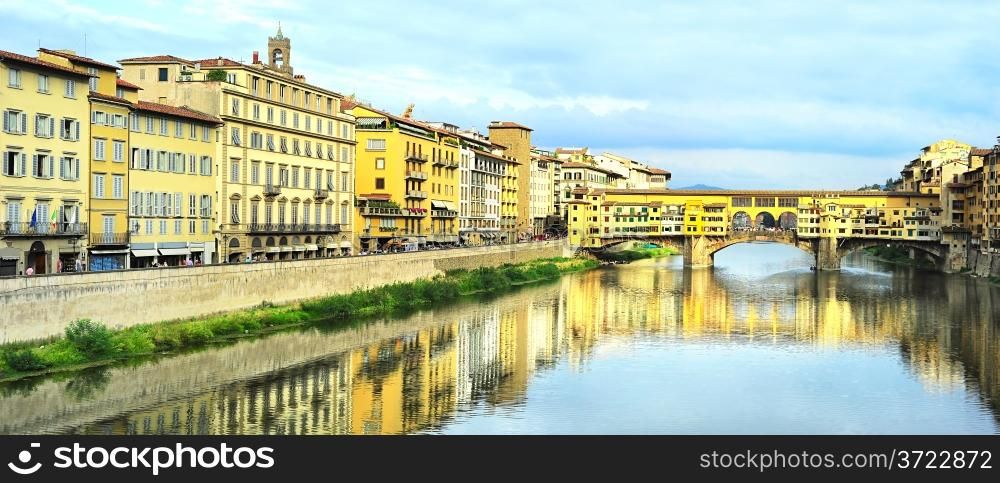 Famous Ponte Vecchio bridge across Arno river in Florence, Italy