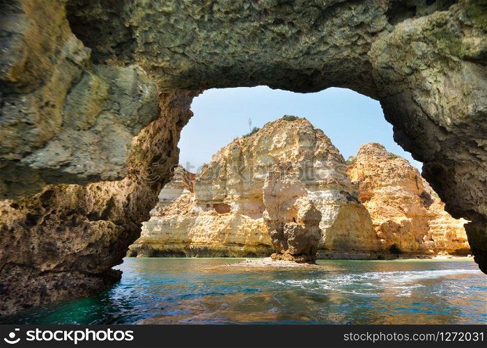 Famous Rocks in Sea, Ocean, Lagos in Portugal. Popular summer travel destination and famous beach at Algarve coastline