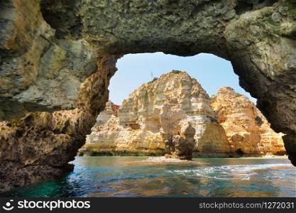 Famous Rocks in Sea, Ocean, Lagos in Portugal. Popular summer travel destination and famous beach at Algarve coastline