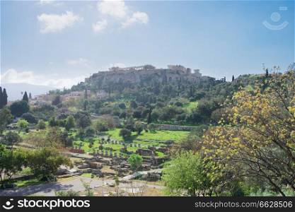 Famous skyline of Athens with Acropolis hill and The Ancient Agora site, Athens Greece. Famous skyline of Athens, Greece