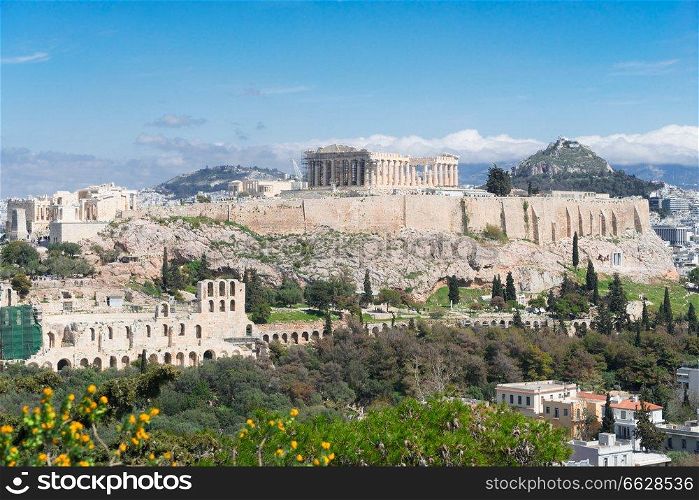 Famous skyline of Athens with Acropolis hill, Pathenon, Herodes Atticus&hitheater and Lycabettus Hill, Athens Greece. Famous skyline of Athens, Greece