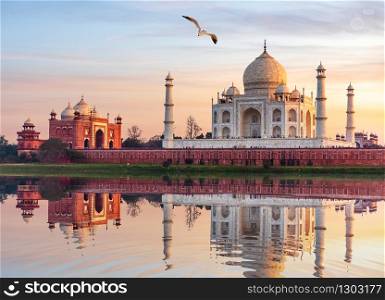 Famous Taj Mahal Mausoleum on the bank of the Yumana river in Agra, India.