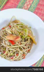 "Famous Thai food, spicy papaya salad or "Somtum" in Thai"