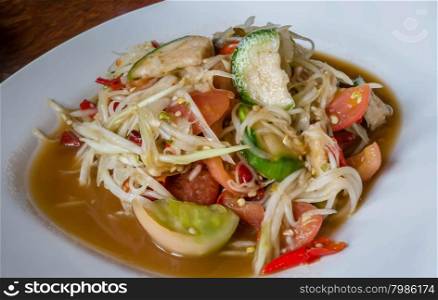 "Famous Thai food, spicy papaya salad or "Somtum" in Thai"