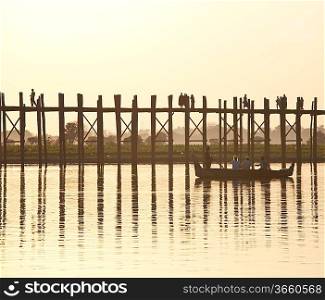 famous tick bridge at sunset in Myanmar