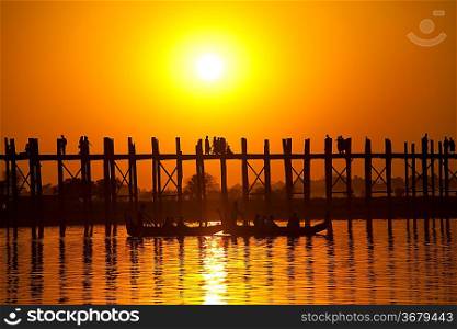 famous tick bridge at sunset in Myanmar