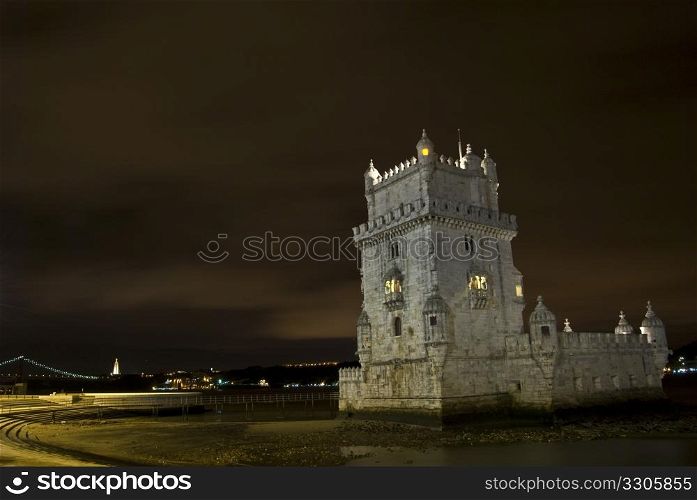 famous Torre de Belem illuminated at night