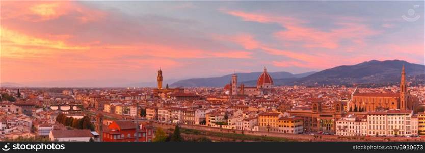 Famous view of Florence at gorgeous sunset, Italy. Panorama of Duomo Santa Maria Del Fiore, tower of Palazzo Vecchio and famous bridge Ponte Vecchio at gorgeous sunset from Piazzale Michelangelo in Florence, Tuscany, Italy