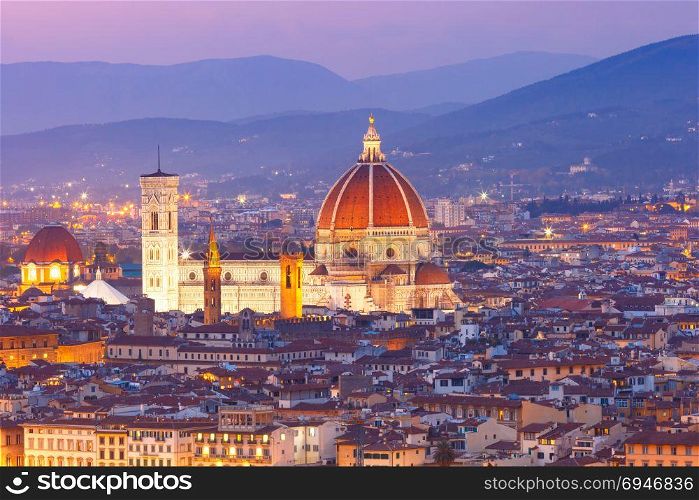 Famous view of Florence at night, Italy. Beautiful panoramic view of Duomo Santa Maria Del Fiore at beautiful sunset in Florence, Tuscany, Italy
