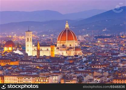 Famous view of Florence at night, Italy. Beautiful panoramic view of Duomo Santa Maria Del Fiore at beautiful sunset in Florence, Tuscany, Italy