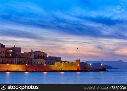 Famouse venetian harbour waterfront of Chania at sunset, Crete, Greece. Venetian harbour at sunset, Chania, Crete, Greece