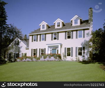 Fancy House on Manicured Lawn