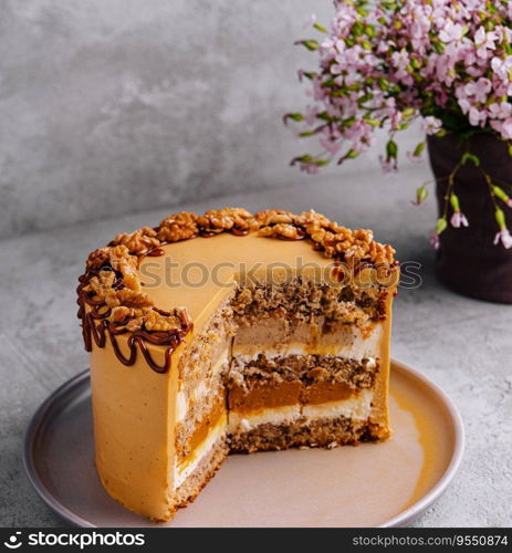 Fancy layered walnut cake with caramel