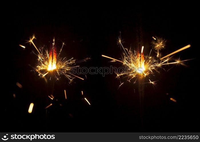 fantastic burning sparklers dark background