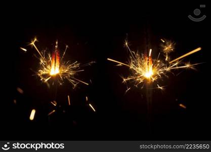fantastic burning sparklers dark background
