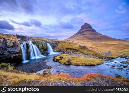 Fantastic evening with Kirkjufell volcano the coast of Snaefellsnes peninsula. Picturesque and gorgeous morning scene. Location famous place Kirkjufellsfoss waterfall, Iceland, Europe. Beauty world.