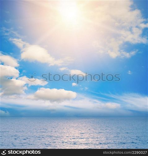 Fantastic landscape photo bright sun over blue ocean