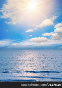 Fantastic landscape photo bright sun over blue ocean and sunny path