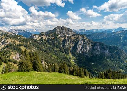 Fantastic panorama view over the Ammergau Alps in summer from the Tegelberg summit near Schwangau.
