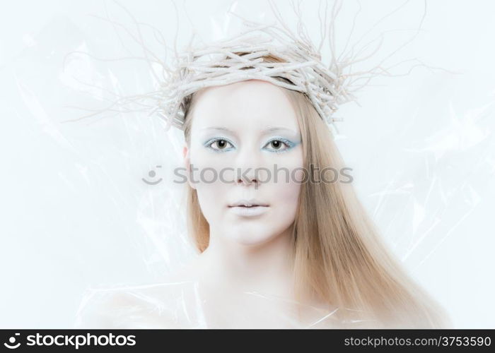 Fantasy ice queen theme, young beautiful woman, studio shot