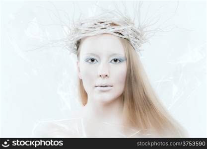 Fantasy ice queen theme, young beautiful woman, studio shot