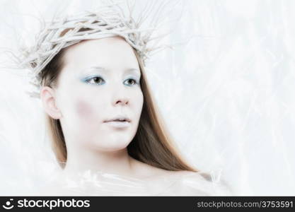 Fantasy ice queen theme, young beautiful woman, studio shot