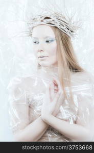 Fantasy ice queen theme, young beautiful woman, studio shot