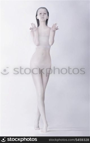 Fantasy. Surreal Bodypainting. Styled Artistic Woman Colored White. Creative Art