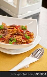 Farfalle. Farfalle with vegetable and beef